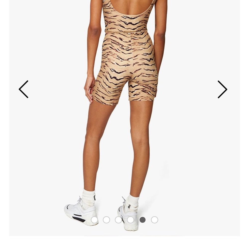 Brand new We wore what unitard with gold belt